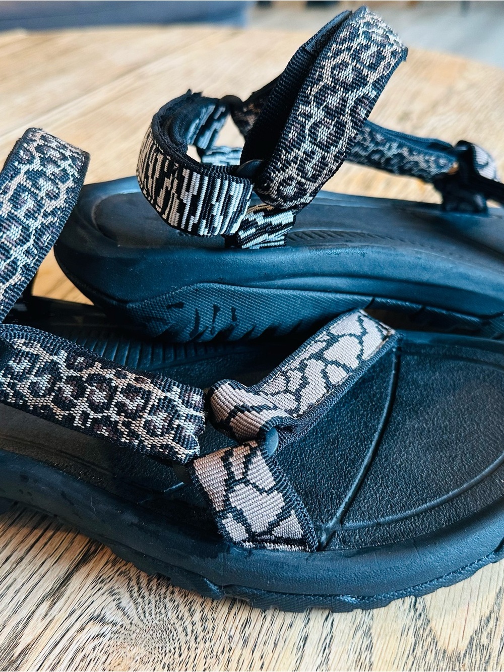 Teva Black Sandals with Tan Patterned Straps